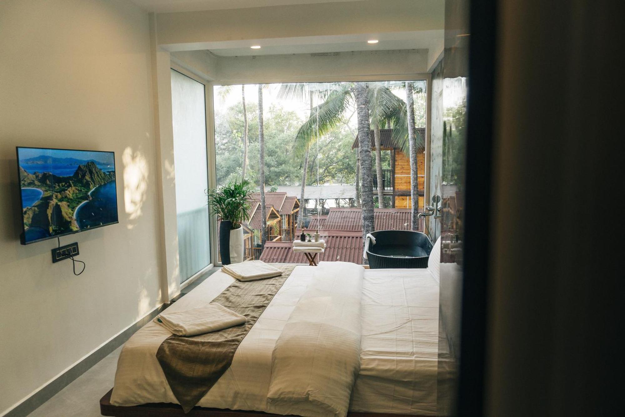 Tranquill Riverside Luxury Cottages With Bathtub, Candolim Buitenkant foto